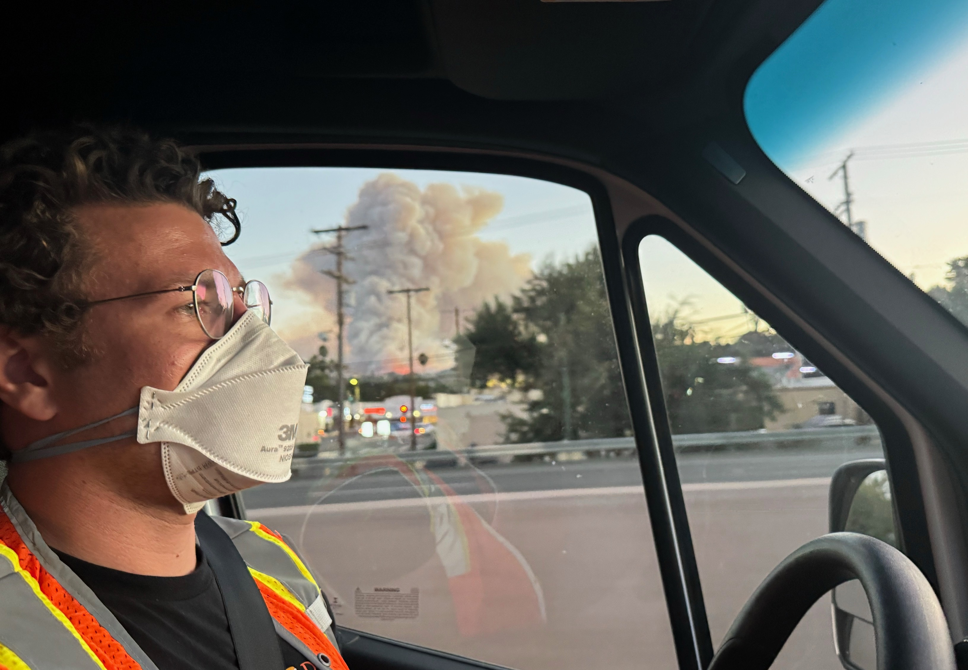 Aaron Rabinowitz observing smoke during wildfire response work